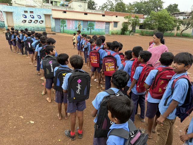 School bags handed to 400+ children